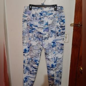 Chico's four pocket, zip up,stretch,  print jeans in Size 2